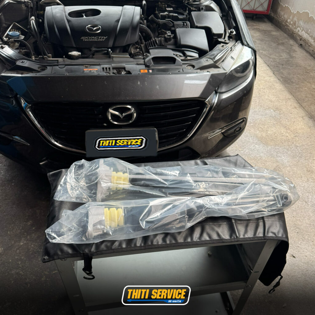 ธิติเซอร์วิส - อู่ซ่อมรถยนต์ กาญจนบุรี-TS2569_0163-เปลี่ยนหัวเทียนmazda2-2 copy