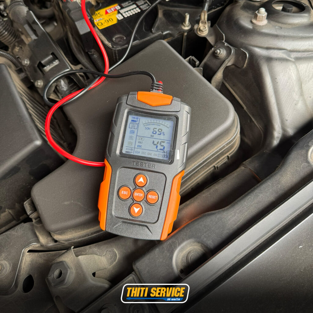 ธิติเซอร์วิส - อู่ซ่อมรถยนต์ กาญจนบุรี-TS2569_0163-เปลี่ยนหัวเทียนmazda2-2 copy 2