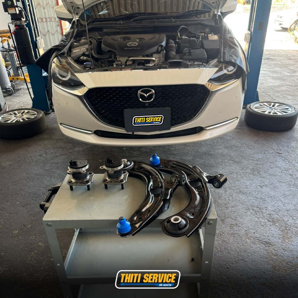 ธิติเซอร์วิส - อู่ซ่อมรถยนต์ กาญจนบุรี-TS2569_0183-mazda2 ลูกปืนล้อหลัง-ปีกนกหน้า-2