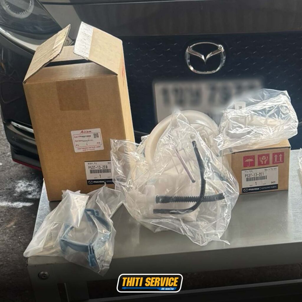 ธิติเซอร์วิส - อู่ซ่อมรถยนต์ กาญจนบุรี-TS2569_0183-mazda2 ลูกปืนล้อหลัง-ปีกนกหน้า-2-2