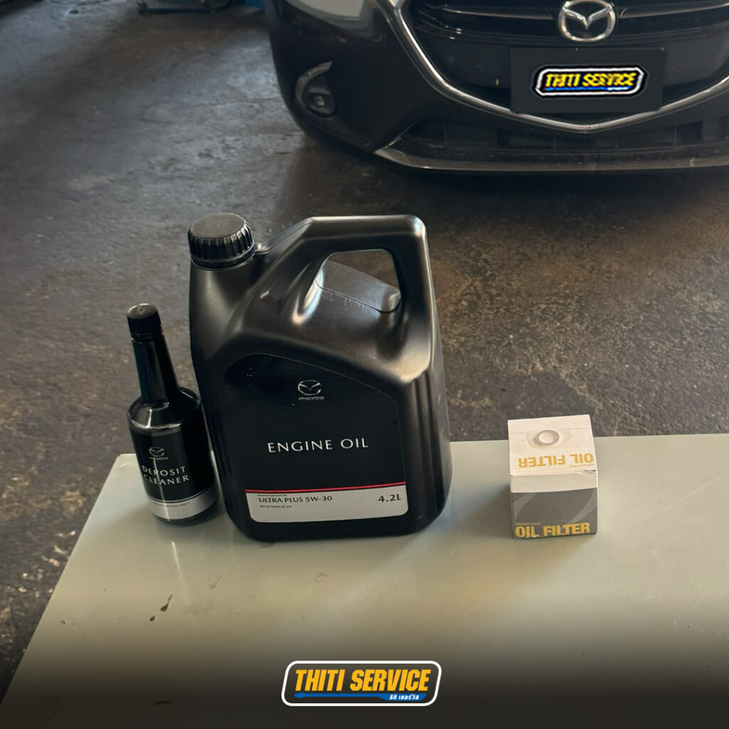 ธิติเซอร์วิส - อู่ซ่อมรถยนต์ กาญจนบุรี-ปิดระบบ i stop-เปลี่ยนหัวเทียน-mazda2-2-1