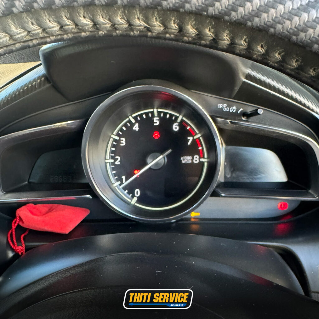 ธิติเซอร์วิส - อู่ซ่อมรถยนต์ กาญจนบุรี-ปิดระบบ i stop-เปลี่ยนหัวเทียน-mazda2-2