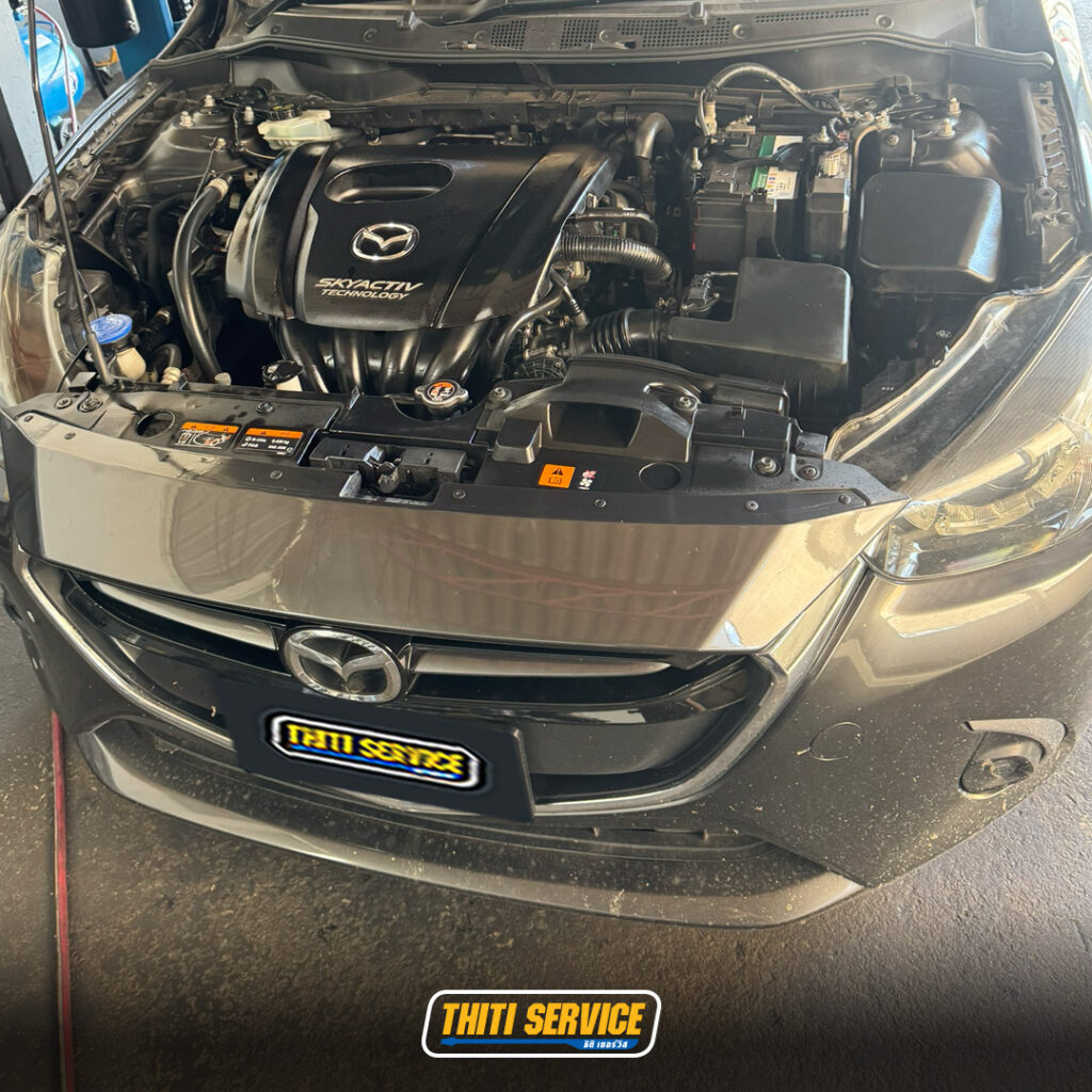 ธิติเซอร์วิส - อู่ซ่อมรถยนต์ กาญจนบุรี-ปิดระบบ i stop-เปลี่ยนหัวเทียน-mazda2-2-2
